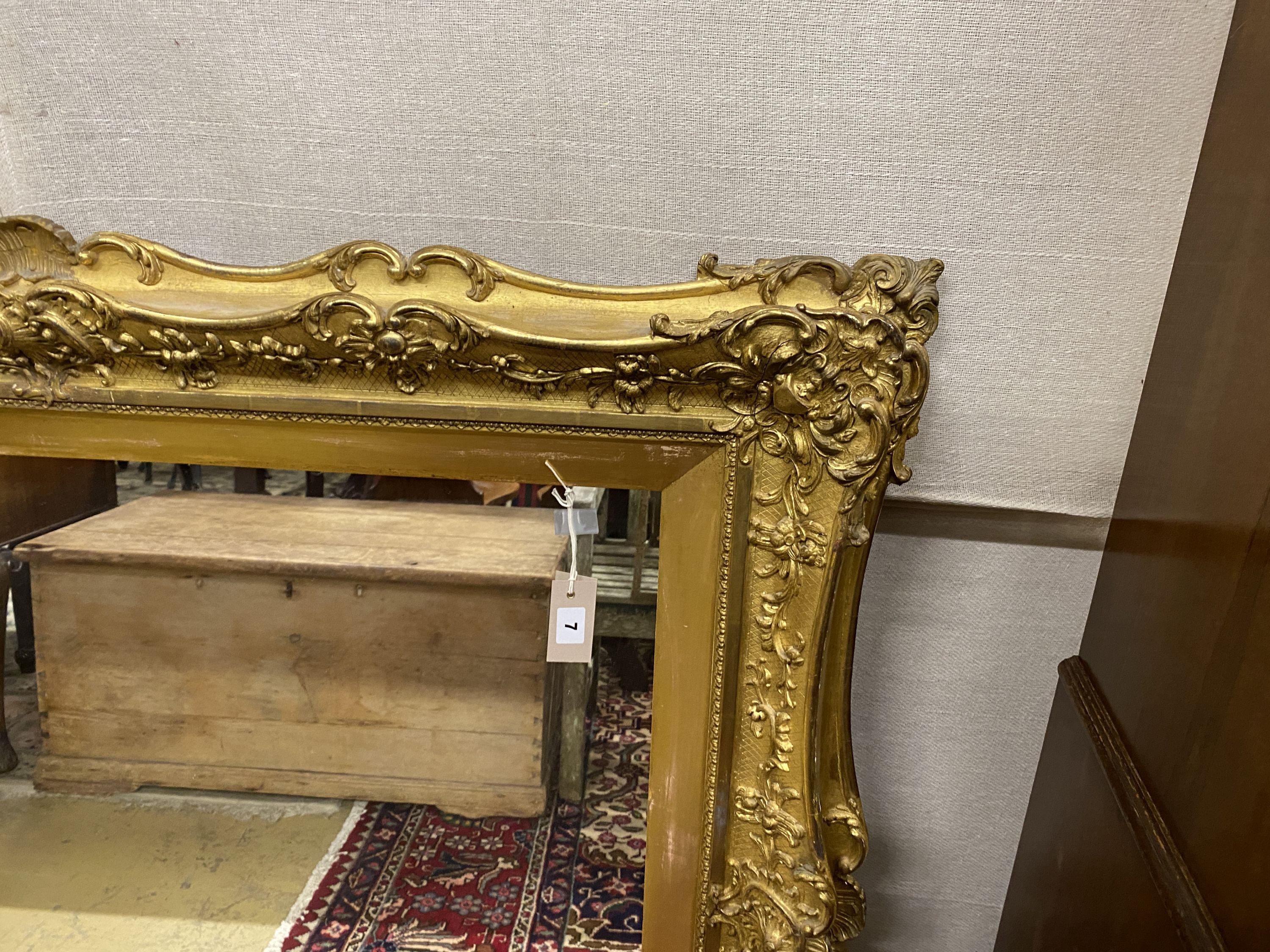 A Victorian giltwood and gesso rectangular wall mirror, width 124cm, height 106cm